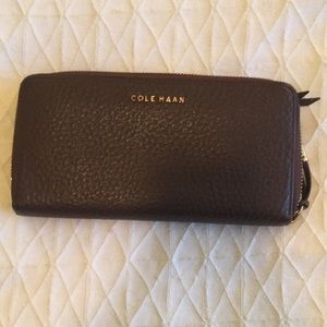 Brown leather come Haan wallet